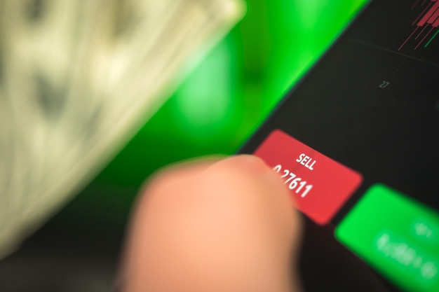 A close-up of a computer screen showcasing a cashback website interface. The screen shows various retail logos with different cashback percentages listed next to them. The focus is on the user-friendly design and clear display of cashback offers.